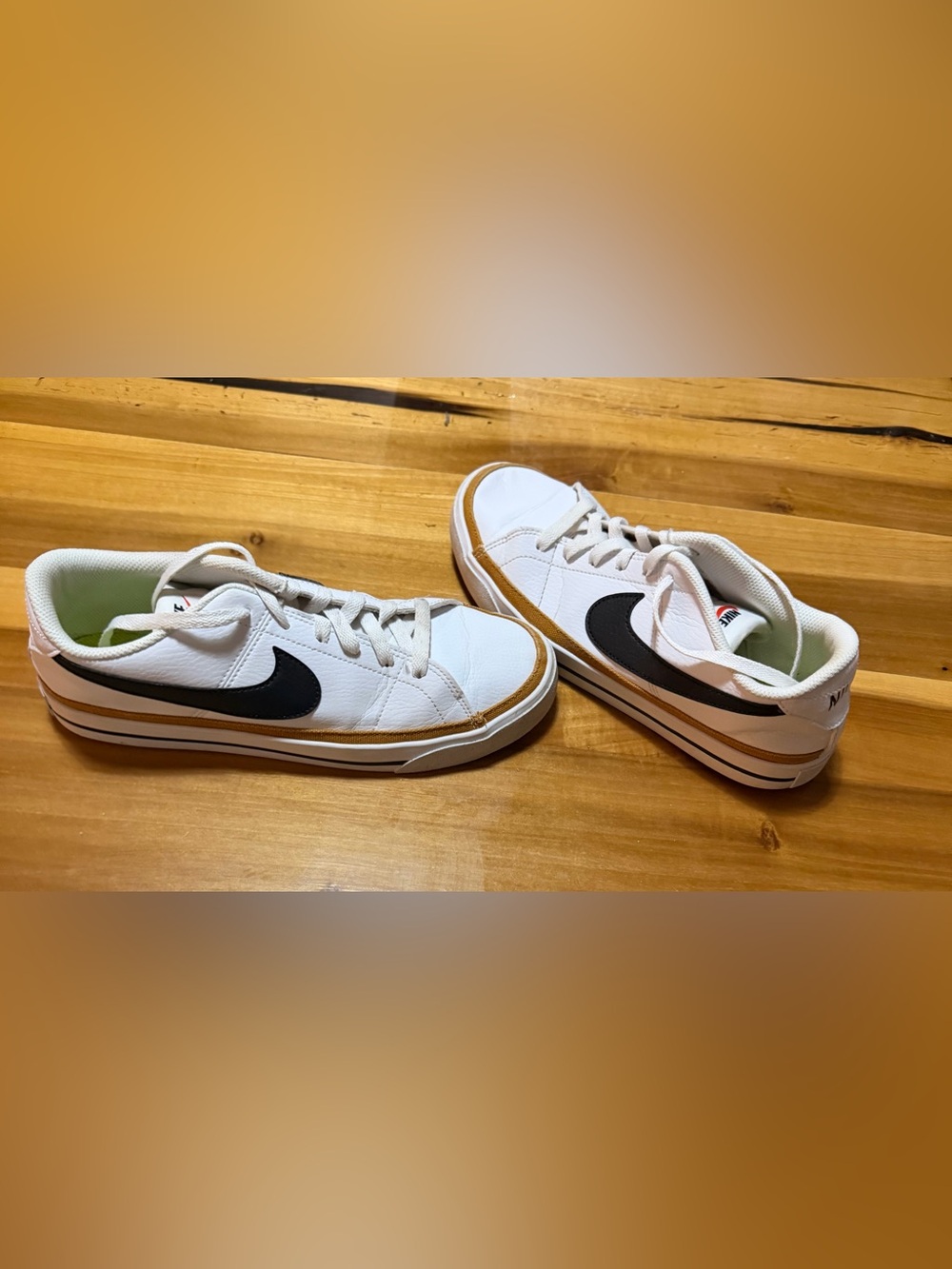 Nike Women’s White Sneakers with Black Swoosh and Gum Trim